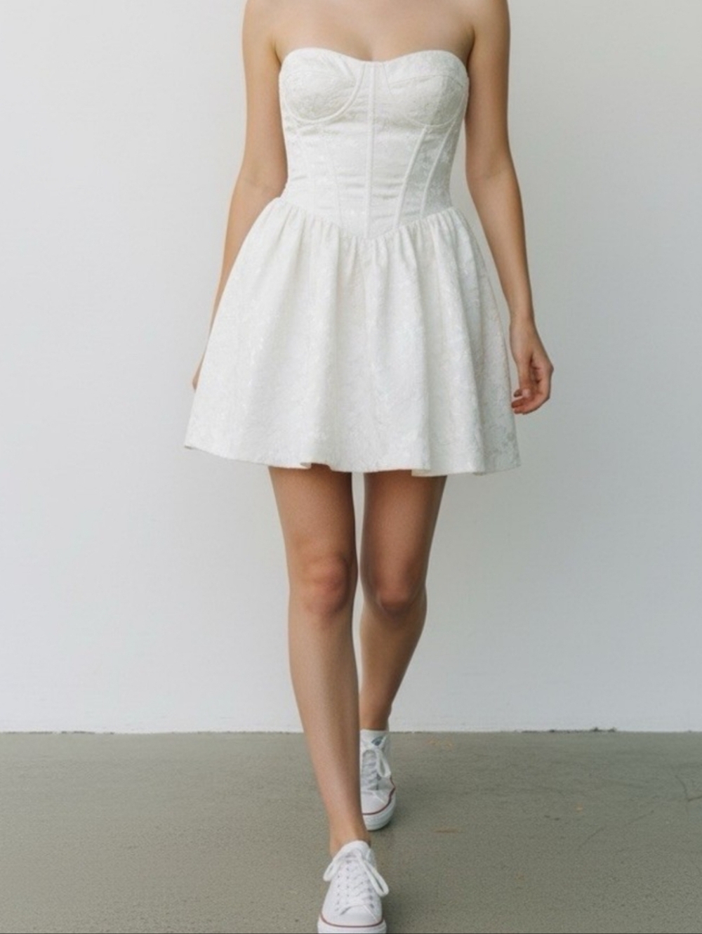White strapless mini dress by My Michelle size 3 rubber over bust
